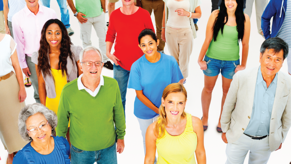 Group of people standing and smiling